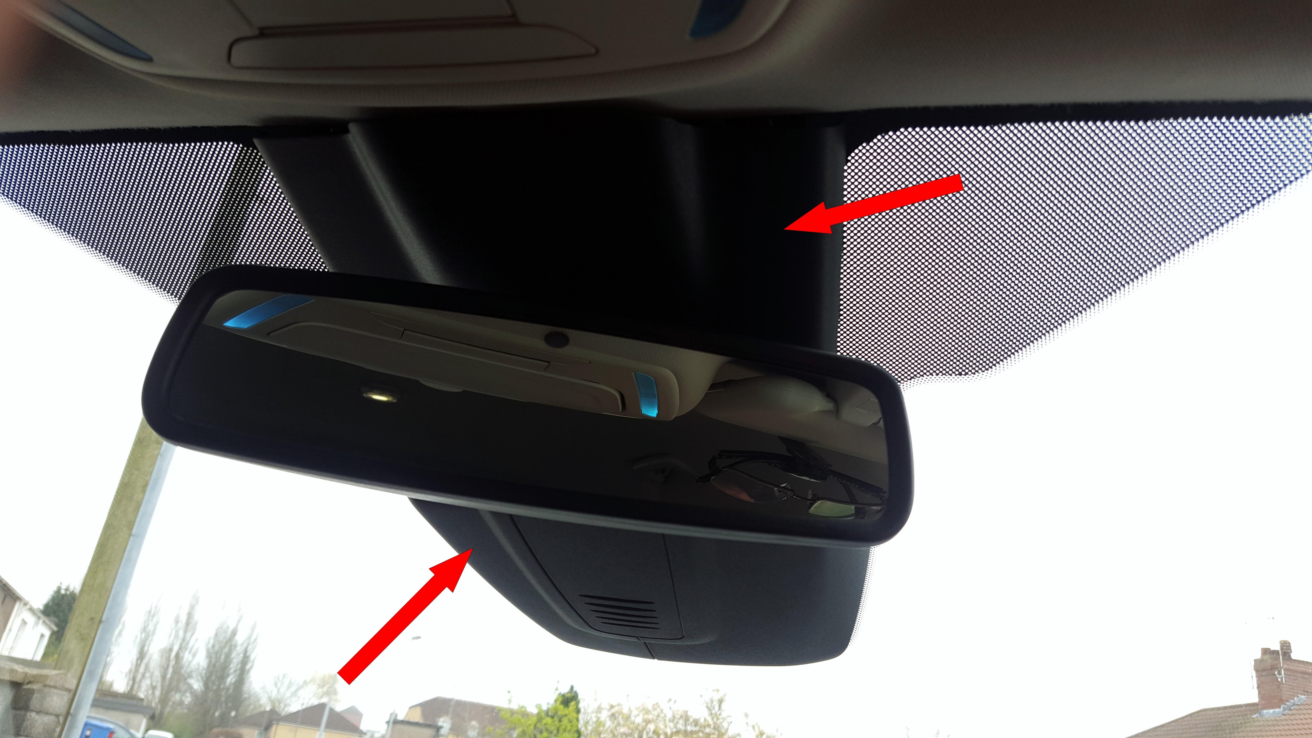 How to remove the plastic cover behind the rear mirror - Ford